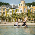 surf yoga by the beach